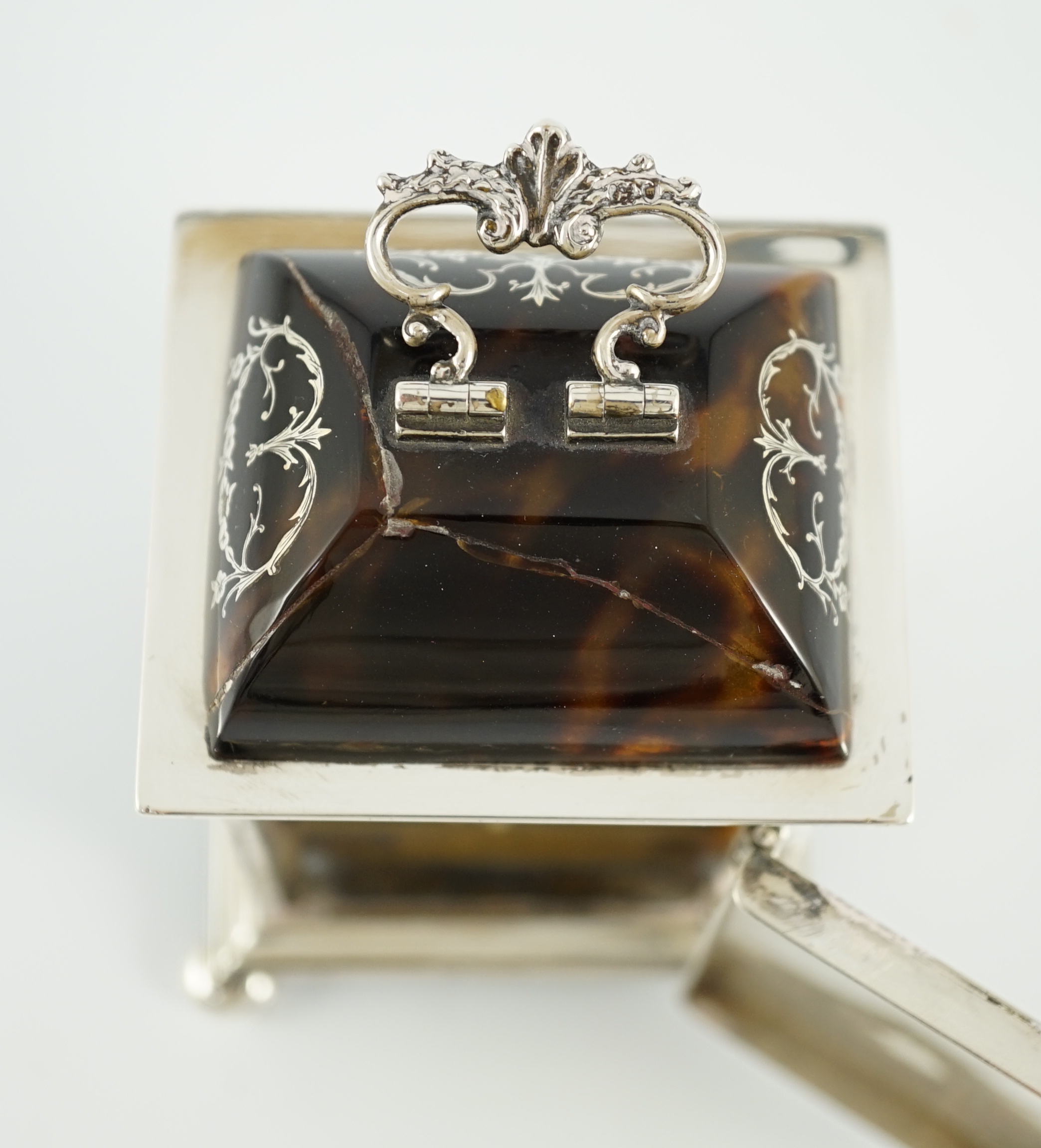 A George V silver and tortoiseshell pique mounted carriage timepiece, by William Comyns